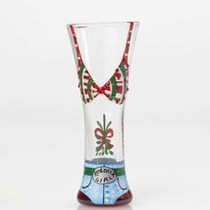 a glass vase with a red bow on it