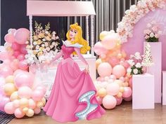 there is a princess standing in front of balloons