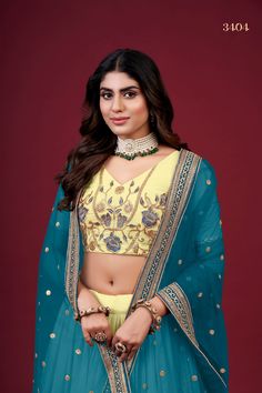 This Yellow Faux Georgette Lehenga Choli Set with Dupatta is adorned with intricate Zari, Thread & Sequins Embroidery, giving it a timeless and classic look. It includes a 3.5 Meter-long lehenga, a blouse with Regular Sleeves and a 2.30 Meter-long dupatta. The fabric is extra-soft and can be customized to your measurements. Washing instructions: Dry Clean. No of Set - 3-piece set Color- Yellow Lehenga Choli Fabric - Faux Georgette Stitch Type - Semi-Stitched (Standard Cancan & Canvas Attached) F Anarkali Sets With Meenakari For Designer Wear, Pista Green Wedding Sets With Unstitched Blouse, Pista Green Wedding Set With Unstitched Blouse, Wedding Set With Unstitched Pista Green Blouse, Designer Fitted Meenakari Choli, Kundan Sets For Navratri, Pista Green Kundan Sets With Traditional Drape, Meenakari Saree Set For Reception, Festive Fitted Meenakari Sets