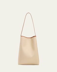 Aesther Ekme "Sac" hobo bag in cotton and faux leather (polyurethane)    Shoulder strap     Open top with magnetic closure     Approx. 14.6"H x 14.2"W x 4.3"D    Made in Spain Canvas Hobo Bag, Open Top, Bergdorf Goodman, Hobo Bag, Magnetic Closure, Tote Handbags, 3 D, Tops Designs, Shoulder Strap