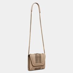 This Mini Giovanna leather clutch balances immaculate tailoring with discreet elegance. Featuring a classic handcrafted braided detailing, and structured frame. A timeless statement that you can wear as a cross-body bag or clutch-style. Nappa soft calfskin Gold hardware Magnetic flap closure Detachable chain crossbody strap, 21.5’’ (54,6 cm) Drop Internal zipped pocket Internal YY logo plaque Ultrasuede lining Height: 6.5'' (16,5cm) Width: 7.5'' (19cm) Depth: 2'' (5cm) Imported. Made in Europe A Yy Logo, Taupe Leather, Leather Cleaning, Leather Care, Luxury Accessories, Accessories Branding, Leather Clutch, Crossbody Strap, Winter Collection