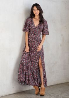 [Color: Black/Fuchsia] This effortless and feminine style features flattering short flutter sleeves Chic Flowy Maxi Dress With Ditsy Floral Print, Flowy Ditsy Floral Print Maxi Dress, Fitted Flutter Sleeve Maxi Dress For Vacation, Bohemian Fitted Dress With Side Slits, Fitted Bohemian Dress With Side Slits, Chic Floral Print Maxi Dress With Flutter Sleeves, Chic Floral Maxi Dress With Flutter Sleeves, Chic Maxi Dress With Flutter Sleeves And Floral Print, Flowy Ditsy Floral Maxi Dress