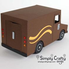 a cardboard box shaped like a delivery truck