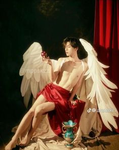 a painting of an angel sitting on the ground with his wings spread out and holding a red apple