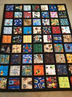 a quilt made with many different colored squares