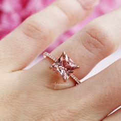 Gorgeous Princess Cut Morganite Ring ►Base Metal: Sterling Silver (925) ►Plating: 14K Rose Gold Vermeil ►Accented with Simulated Diamonds (CZ) ►Average band width: 2 mm Center Stone: Morganite Shape: Princess Gem size: 8.0 x 8.0 mm Carat Weight: 3 ct. (diamond equivalent) Gemstone creation: Simulated Hardness: 8 (Mohs scale) ►Matching band can be purchased here: https://www.etsy.com/listing/880783278/2mm-rose-gold-wedding-band-14k-rose-gold?ref=listings_manager_grid ►Please be aware that plated Rose Gold Gia Certified Wedding Jewelry, Rose Gold Gia Certified Jewelry For Wedding, Gia Certified Rose Gold Diamond Promise Ring, Gia Certified Morganite Rings In Fine Jewelry Style, Morganite Ring With Prong Setting For Proposal, Morganite Rings With Prong Setting For Proposal, Morganite Rose Gold Proposal Jewelry, Rose Gold Princess Cut Jewelry With Accent Stones, Rose Gold Princess Cut Ring With Accent Stones