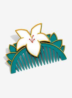 a green and white comb with a flower on it's side, against a white background