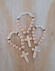 A spin on my original and popular finger rosary, these now come personalized by popular demand and available in rose gold, gold, bronze silver and gunmetal  If you have an special requests or want a combination of metals, stones, names etc please message me.  These rosaries are bulk discounted, please select qty from drop down menu. White Cross Jewelry For Personalized Gift, Customizable White Rosary Bracelet As A Gift, White Cross-shaped Jewelry For Personalized Gift, Customizable White Rosary Bracelet As Gift, Customizable White Rosary Bracelet Gift, Adjustable Rose Gold Rosary As Gift, Spiritual Rosary Bracelet With Cross For First Communion, Personalized Spiritual Rosary Gift, Personalized Cross Rosary Bracelet For Baptism