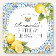 a happy birthday celebration with lemons and flowers on blue tile coaster, featuring the words amadelle's birthday celebration