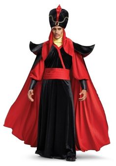 a man dressed in black and red is standing with his hands on his hips while wearing a costume