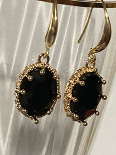 18k gold plated black glass crystal diamanté ornate deep set oval crystal cabochon drop charm earrings  many others colours in the range  The earwires are nickel free,18k gold rhodium plated on a copper base metal Oval Jewelry With French Hook For Gifts, Black Oval Jewelry For Party, Formal Oval Gold Crystal Earrings, Yellow Gold Oval Jewelry With French Hook, Gold Cabochon Drop Earrings, Nickel-free Oval Jewelry For Party, Black Cabochon Earrings For Evening, Evening Black Cabochon Earrings, Party Cabochon Jewelry