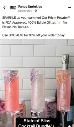 three pink and white cocktails sitting on top of a counter next to cans of soda