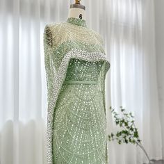 Green Pearl Dress, Cape Dresses Formal, Black Pearl Dress, Walima Outfit, Cape Dresses, Arabic Women, Yellow Evening Dresses, Silver Evening Dress, Grey Evening Dresses