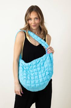 Whether for work, shopping, going to the gym, or traveling, this Large Carryall Quilted Puffer Bag for Women in Blue is the perfect accessory. Featured with a puffer quilted design and many zipper pockets, this bag is not only practical for everyday use but also super trendy and stylish! Features: Do everything in love Style: QBS320125-AQUA Color: Aqua Blue 100% Polyester Featured with fashion puffer quilted design Interior zipper pocket Zipper pocket outside side Zipper close top Lightweight W: Puffer Bag, Do Everything In Love, Color Aqua, Aqua Color, Do Everything, Going To The Gym, Bag For Women, Design Interior, The Gym