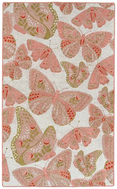 a rug with pink and green butterflies on it