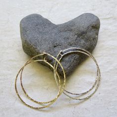 "Sterling Silver Hoop Earrings~ Simple yet elegant sterling silver threader hoops, hammered and polished for that extra sparkle. Choose the size hoops you would like from the drop down menu 1\" 1.5\" Also available in 14k gold fill~ https://www.etsy.com/listing/810213511/gold-hoop-earrings-threader-hammered?ref=shop_home_active_1&frs=1 *Models wearing similar design Shop~ http://www.etsy.com/shop/HanaMauiCreations?ref=pr_shop_more International buyers please read our shipping policies before Dainty Hammered Hoop Earrings, Dainty Hammered Round Hoop Earrings, Silver Dainty Hammered Hoop Earrings, Dainty Hammered Silver Hoop Earrings, Hammered Hoop Earrings For Gift, Dainty Small Hoop Hammered Jewelry, Hammered Hoop Earrings Gift, Hammered Hoop Earrings As Gift, Gift Hammered Hoop Earrings