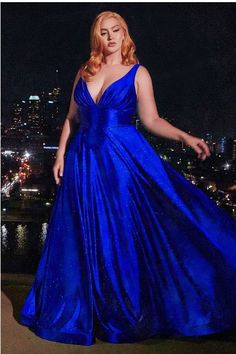 Upgrade your formal attire with our Luxurious Plus Size Sleeveless Glitter Satin A Line Gown. Made with high-quality glitter satin fabric, this gown is luxuriously soft and eye-catching. Its sleeveless design and A-line silhouette flatter all body types, making you look and feel elegant for any occasion. 95% Polyester, 5% Spandex Machine Wash Brand Size Dress Bust Waist Hip XS 0-2 31-32.5'' 23-24'' 31-34" S 4--6 33-35'' 25-26'' 35-37" M 8--10 35-36'' 27-28'' 38-39" L 12--14 38-40'' 29-31'' 40-42 Outfits Azul, Stretch Satin Fabric, Cinderella Divine, Plus Size Prom, Sleeveless Gown, Contemporary Chic, Satin Gown, A Line Gown, Stretch Satin