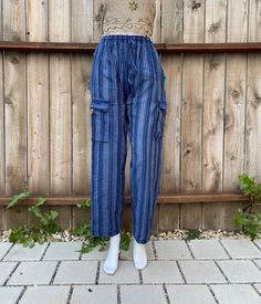 Striped Hippie Trousers  Simple unisex summer pants with 4 side pockets and 1 back pocket.  Elastic drawstring with straight leg fit.  100% Cotton (not pre-shrunk)  Sizes M / L / XL correlate to US Size S / M / L  Length is 39in Hand wash with cold water and hang dry  Please message with any questions Summer Stretch Pants With Cargo Pockets, Hippie Straight Leg Summer Bottoms, Summer Stretch Bottoms With Cargo Pockets, Summer Beach Parachute Pants With Pockets, High Waist Cotton Hippie Pants, Striped Long Pants With Pockets, Fitted Cotton Cargo Pants For Summer, Summer Festival Straight Leg Bottoms, Casual Straight Leg Festival Pants