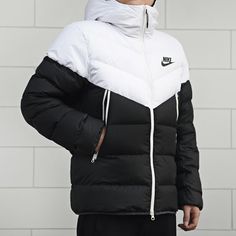 Are you an avid lover of Nike down jackets? If so, you will be glad to know that KICKS CREW offers the best selection of Nike Black Hooded Down Jackets. Whether you are in need of a lightweight option for mild weather or a heavy-duty one to protect from inclement conditions, we have exactly what you need. With multiple sizes and styles available, we guarantee that our Nike black hooded down jackets will meet all your winter apparel needs!