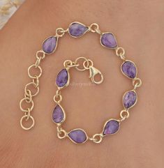 Charoite Bracelet / 18k Gold Plated Sterling Silver Bracelet / Handmade Gemstone Bracelet / Boho Jewellery / Gift For Her Gemstone Name - Charoite Stone Quality - AAA Base Metal - 925 Sterling Silver. Bracelet Weight - 4.6 gm Stone length :- 7 MM, Stone Width :- 5 MM Bracelet Length - 6 inch to 9 inch sizes are available, we give 0.5 inch adjustable in the size which you order ( NOTE - 0.5 INCH ADJUSTABLE IS INCLUDED IN YOUR ORDERED SIZE ) Stone Shape - As shown in the picture You'll get the exact product as shown in the pictures We serve complete 925 sterling silver Jewelry and genuine properties of the stone. The products are dispatched from the small business from USA. Product Quality and Packaging - Our all products are 925 Silver Stamped which shows that the product is genuine and aut Sterling Silver Bracelets Handmade, Boho Jewellery, Bracelet Boho, Jewellery Gift, Bracelet Handmade, Sterling Silver Bracelet, Boho Bracelets, Gemstone Bracelet, 925 Sterling Silver Jewelry