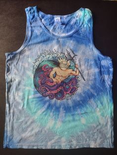 The Sea God Boognish on a cotton men's/unisex cotton tie-dyed tank top comes with the golden eel on the back unless you request it to be blank. The golden eel's speech has been redacted because I cannot reveal the words of the golden eel. Acid Wash Cotton Tank Top For Festivals, Festival Acid Wash Cotton Tank Top, Washed Cotton Vest, Cotton Tie Dye Tank Top For Festivals, Hand Dyed Cotton Tank Top, Acid Wash Cotton Tank Top, Blue Cotton Washed Vest, Blue Washed Cotton Vest, Blue Washed Sleeveless Tank Top