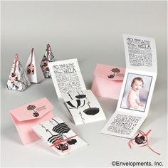 some pink and white cards with pictures on them