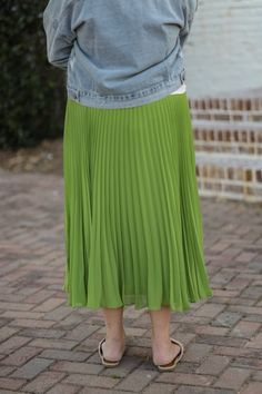 The Chasity Pleated Skirt has such an elegant style! This midi length skirt is fully lined and is detailed with accordion pleats. This flowy, fun skirt is perfect to jazz up your style! - Elastic waistband - Accordion-style pleats - Midi length - Fully lined - Material: Self: 100% Polyester | Lining: 100% Polyester - Model is wearing a small Color Disclaimer: Actual colors may vary due to computer monitors. *Measurements are taken flat, and then doubled.* Size Waist Length Small 25" 32" Medium 2 Spring Full Maxi Skirt With Elastic Waistband, Party Flared Pleated Skirt With Elastic Waistband, Summer Long Pleated Skirt With Pleated Hem, Spring Flowy Pleated Skirt, Spring Midi Pleated Skirt With Elastic Waistband, Spring Flared Pleated Skirt With Elastic Waistband, Spring Elastic Waistband Flared Pleated Skirt, Fitted Pleated Skirt For Spring, Flowy Party Maxi Skirt With Pleated Hem