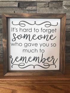 a framed sign that says it's hard to forget someone who gave you so much to remember