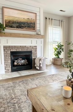 a living room filled with furniture and a fire place