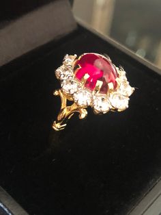 The Ring is made of 925 Sterling Silver Set with Simulants of Ruby and Diamond,Main stones can be replaced on request with a Stone Color of your Choice. This item can be made in Yellow, White or Rose Gold variations of 10K,14K,18K and 925 Silver as well as per your demand. The additional stone options listed are Simulated versions of the said Gemstones and not Natural Gemstones. These are custom made items and are made to order. Request to please clarify all your doubts and queries before placin Elegant Ruby Rings With Oval Cabochon Center Stone, Ruby Rings With Center Stone, Oval Cabochon Shape, Formal Ruby Ring With Oval Cabochon, Formal Ruby Ring With Oval Cabochon Center Stone, Gold Ruby Ring Oval Cabochon For Anniversary, Gold Ruby Ring With Oval Cabochon For Anniversary, Oval Cabochon Ruby Wedding Jewelry, Ruby Oval Cabochon Wedding Jewelry, Wedding Ruby Oval Cabochon Jewelry