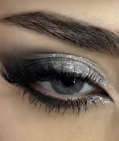 Black Eyeshadow Looks With Glitter, Siren Eyes Eyeshadow, Smokey Eyeliner With Glitter, Grey And Silver Eyeshadow, Black And Silver Makeup Ideas, Dark Glitter Makeup Looks, Silver Glitter Eyeliner Looks, Star Glitter Eye Makeup