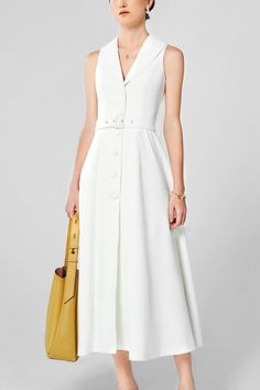 Modern A-line Maxi Dress For Spring, Chic Belted A-line Sleeveless Dress, White A-line Maxi Dress With Buttons, Elegant A-line Sleeveless Dress With Buttons, Chic A-line Sleeveless Dress With Buttons, Elegant Sleeveless Dress For Spring Dressmaking, Modern White Sleeveless Midi Dress, Chic Structured Sleeveless Dress, White Structured Dress For Work