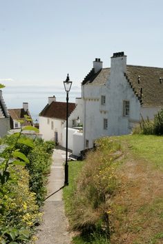 the house is on the hill overlooking the ocean