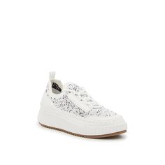 DV by Dolce Vita-Feenyx Platform Sneaker - Kids' Your little fashionista will love rocking the Feenyx platform sneakers from DV by Dolce Vita. This pair features the comfort of their favorite active shoes, while the wedge heel and moc toe adds a stylish touch. Complete with a spottted print for a playful twist. Not sure which size to order? Click here to check out our Kids’ Measuring Guide! For more helpful tips and sizing FAQs, click here . White Wedge Sneakers For Spring, White Rubber Sole Wedge Sneakers For Spring, White Sporty Wedge Sneakers For Spring, White Platform Wedge Sneakers For Spring, White Platform Sneakers With Rubber Sole For Spring, Spring White Platform Sneakers With Rubber Sole, Spring Wedge Sneakers With Perforated Toe Box, Trendy White Platform Sneakers With Rubber Sole, White Textile Platform Sneakers With Laces