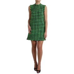 Discover Luxury With A Touch Of Timeless Elegance With This Stunning Dolce & Gabbana Houndstooth Mini Dress. Beautifully Crafted From High-Quality Virgin Wool Blend, It’s Designed To Make A Statement At Any Event. The Chic Green Color And Flattering Silhouette Provide A Look Of Opulence And Style. This Must-Have Piece Features A Secure Zipper Closure And The Iconic Logo Detail, Exhibiting Italian Craftsmanship At Its Finest. Color: Green Material: 92% Virgin Wool 8% Nylon Lining: 97% Polyester 3 Aline Mini Dress, Knitted Mini Skirt, Female Owned Business, Dress Colour, Skirt Model, Dolce Gabbana Dress, Italian Craftsmanship, Black Chevron, Bc Canada