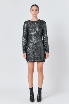 Look effortless and stylish in this gorgeous Open Back Sequin Dress. Crafted from shimmering sequined fabric with a round neckline and long sleeves, this dress oozes sophistication. Its open-back detail adds a touch of glamour, making this piece the perfect party dress. Stand out in the crowd with this stunning dress and be the center of attention. Highlight your curves by pairing this dress with heels and a clutch. Sequined fabric Round neckline Long sleeves Open back Metal zip closure Lined Ha Sequined Fabric, Jumpsuit Fall, Knitwear Trends, Dress Stand, Denim Sweater, Tweed Dress, Blazer And Shorts, Silver Dress, Heat Styling Products