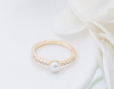 14K gold-plated freshwater pearl baby ring with sparkling CZ band. Designed with all precious metals (sterling silver with 14K gold plating). This makes a precious Pearl Baby Ring for your little princess! These are high-quality rings that are E-coated to prevent tarnish for little girls, toddlers, and kids. This children's ring comes in a beautiful black velvet heart-shaped box and is available in sizes 1-5. Ring Sizing: https://cherishedmomentsshop.com/pages/sizing-charts Baby Ring, Quality Rings, Baby Rings, Precious Rings, Baby Pearls, Kids Rings, Velvet Heart, Little Princess, Gold Plating