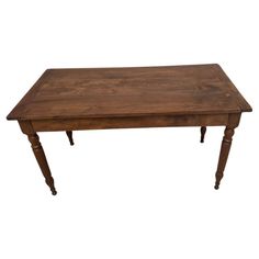 an old wooden table with two legs and a square top, on a white background