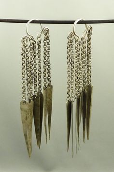 "Old silver earrings from one of the Hill tribes inhabiting the Golden triangle in SE Asia - border of Laos, Thailand and Myanmar, most probably from the Lahu people. They have to be wear on extended earlobes holes. The top ring tested for high-grade silver (+800), the dangles are made of low-grade silver. From mid XXth century or earlier. Dimensions: Height: 12,5 cm (4,92 in) Width: 4 cm (1,57 in) Weigth: 36 gr SEA282 Genuine Hill tribe silver like these earrings are more and more difficult to Hmong Jewelry, Tribe Jewelry, Glasses For Your Face Shape, Diy Jewelry To Sell, Diy Jewelry Rings, Jordan Jewelry, Asian Jewelry, Diy Jewelry Unique, Diy Jewelry Inspiration