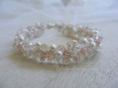 Tana Bracelet  Crystal & Pearl by KathleenBarryJewelry, #blushpink #blush #blushwedding #pinkjewellery #pinkbride #blushbrecelet #weddingbracelet Pink Crystal Wedding Bracelets, Pink Pearl Bracelet For Wedding, Delicate Pink Bracelets For Wedding, Delicate Pearl White Beaded Bracelets For Wedding, Delicate Pink Pearl Bracelet For Wedding, Delicate Pearl White Beaded Bracelet For Wedding, Delicate Pink Bracelet For Wedding, Adjustable Pink Crystal Bracelet For Wedding, Pink Pearl Drop Bracelet For Wedding