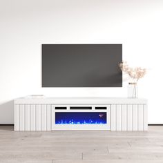 a white entertainment center with a television mounted on it's side