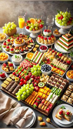 a table filled with lots of different types of food on plates and trays next to each other