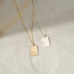 When it comes to tag necklaces, our Amy tag necklace is the perfect fit. Personalize it with a strong meaning, names, dates, or encouraging words. Each tag is handmade and hand-stamped by our team. P R O D U C T * D E T A I L S - Tag measures 15x10mm - Satin finish - Available in Sterling Silver, 14k Gold Filled, and 14K Rose Gold Filled H O W * T O * O R D E R Step 1: Use the first drop-down menu to select your necklace length and material Step 2: Use the second drop-down menu to select your al Stamped Rectangular Pendant Necklace For Gift, Engraved Rectangular Jewelry For Best Friend, Personalized Rectangular Jewelry For Best Friend Gift, Father's Day Gift Necklace With Rectangular Pendant, Encouraging Words, Necklace Initial, Necklace Simple, Monogram Necklace, Personalized Tags