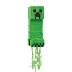 a green minecraft creeper hanging from a string