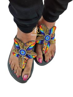 African Sandals. Made using high quality leather And beads. Multicolor Open Toe Slingback Sandals For Beach, Handmade Slip-on Sandals For Summer, Multicolor Toe Loop Sandals For Summer, Summer Beaded Slip-on Sandals, Beaded Slip-on Sandals For Summer, Multicolor Open Toe Huarache Sandals For Beach, Multicolor T-strap Sandals With Round Toe For Beach, Multicolor Toe Loop Sandals For Vacation, Multicolor Open Toe T-strap Sandals For Vacation