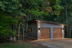 a garage in the middle of a wooded area