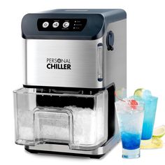 the personal chiller is next to two glasses with drinks in it and ice cubes on the side