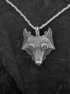 "This Wolf Head pendant is Sterling Silver. The included chain is a Sterling Silver Rope chain. You may choose 16, 18 or 20 inch at the same price. Other length available at sightly higher prices. This Wolf Head pendant measures 1 1/2\" tall by 1 3/8\" across. I hand cast all my pieces using the lost wax casting method. Please ask your needs. You may call me with questions, often I am out so please use my machine. 831-476-3176. Satisfaction Guaranteed! I send items USPS First Class unless otherw Stainless Steel Pendant Necklace, Symbolic Necklace With Large Pendant For Formal Occasions, Stainless Steel Large Pendant Necklaces, Formal Symbolic Necklace With Large Pendant, Symbolic Formal Necklace With Large Pendant, Formal Engraved Stainless Steel Necklace, Formal Stainless Steel Engraved Necklace, Symbolic White Gold Necklaces With Box Chain, Symbolic White Gold Necklace With Box Chain