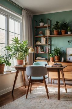 a room with green walls and lots of plants on the windowsill, along with a desk