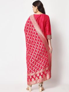 This is a beautiful 3-piece suit set. It comes with straight cut kurta with embroidery detailing on neck & sleeves has 3/4th sleeves, round neck & calf length teamed with solid straight pants and a georgette banarasi dupatta. 3-piece set Color- Pink Work- Embroidery work on neck & sleeves Kurti Length - 46 inch Kurta Fabric-Cotton Silk Bottom Fabric -Cotton Silk Dupatta Fabric - Georgette Banarasi dupatta Sleeves-3/4th Sleeves Neck-Round Neck Care - Dry Clean Banarasi Silk Palazzo Set With Resham Embroidery, Banarasi Silk Kurta With Resham Embroidery, Unstitched Banarasi Silk Straight Kurta, Transitional Season Straight Kurta With Dupatta, Semi-stitched Banarasi Silk Straight Kurta, Semi-stitched Banarasi Silk Unstitched Suit, Unstitched Palazzo Set With Straight Kurta For Celebration, Festive Unstitched Suit With Straight Kurta For Transitional Season, Transitional Season Festive Unstitched Straight Kurta Suit